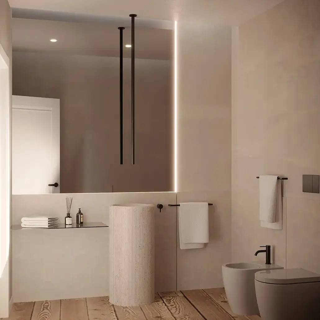 Ristrutturazione bagno Brescia: bagno con lavandino di design a caduta acqua - Giallo Pastello Interior Design Brescia