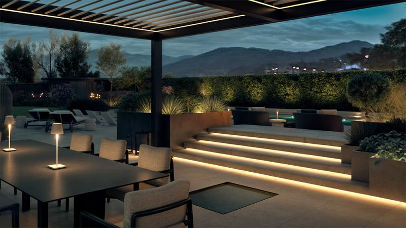 Arredo Outdoor con zona pranzo vista di notte - Giallo Pastello Interior Design Brescia