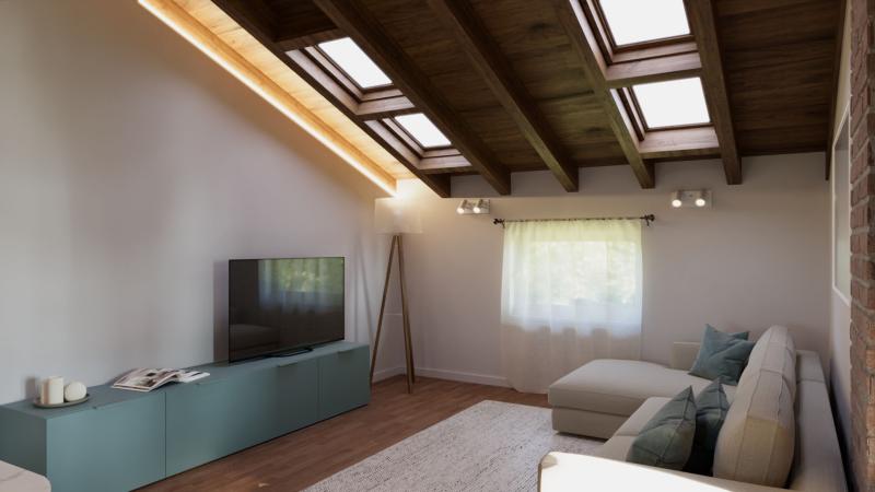 Ristrutturazione Mansarda su Misura: zona tv con divano - Giallo Pastello Interior Design Brescia